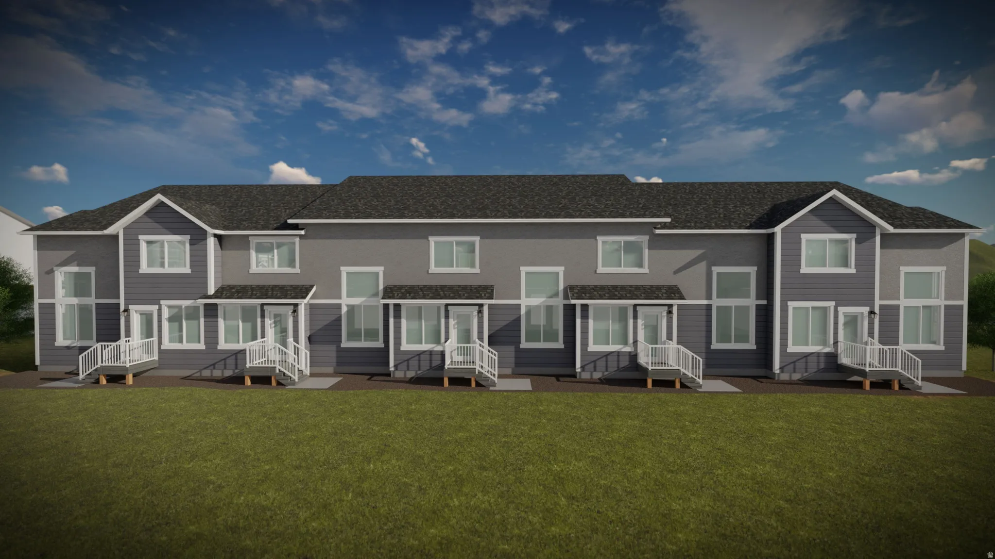 Contemporary multi-unit residence with a dark gray shingle roof and a light gray and dark gray siding facade