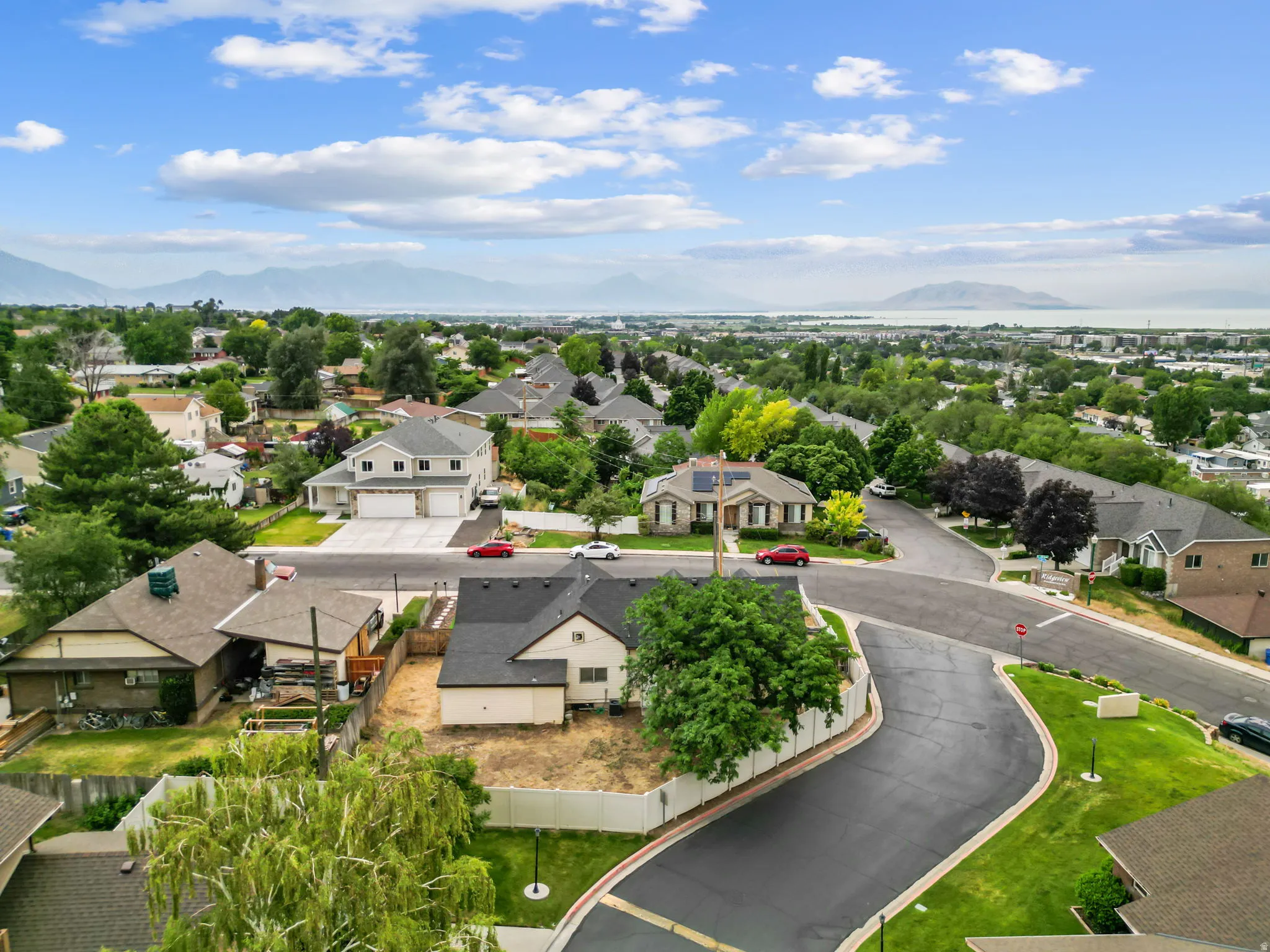 Expansive neighborhood setting with established homes and mature trees