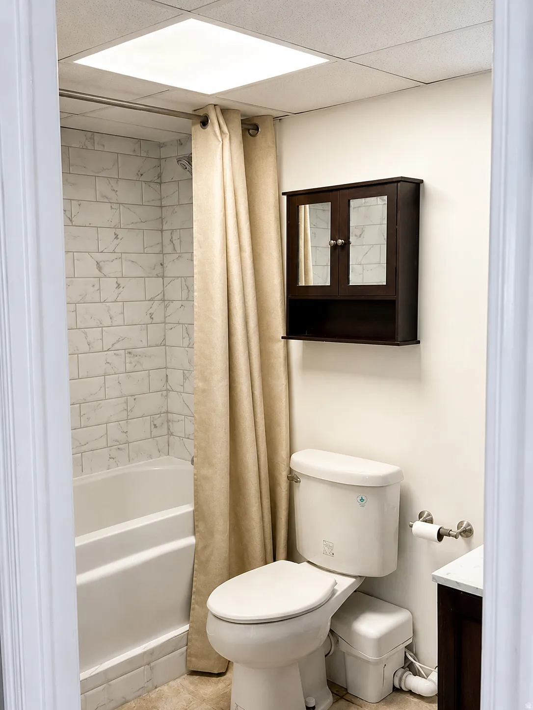 White subway tile shower surround with integrated tub