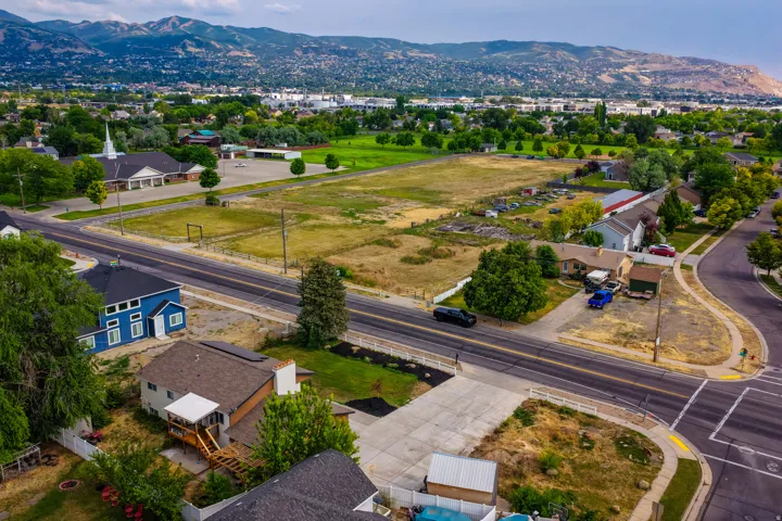 Mountain backdrop framing the cityscape and surrounding green spaces