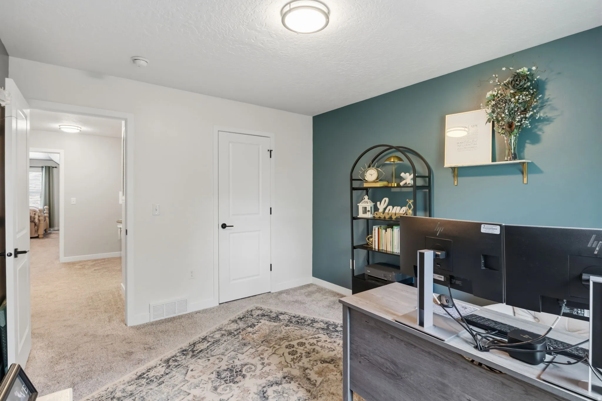 Upstairs bedroom utilized as home office