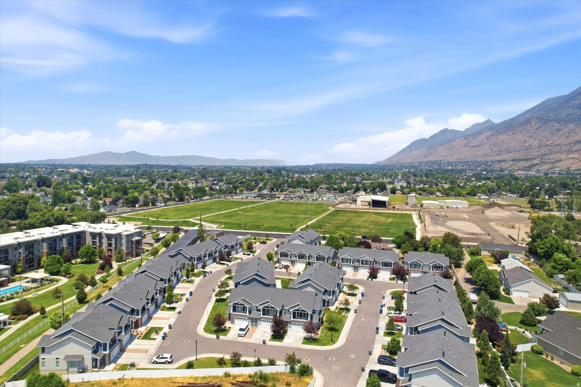 Residential community featuring multi-story townhomes and detached residences