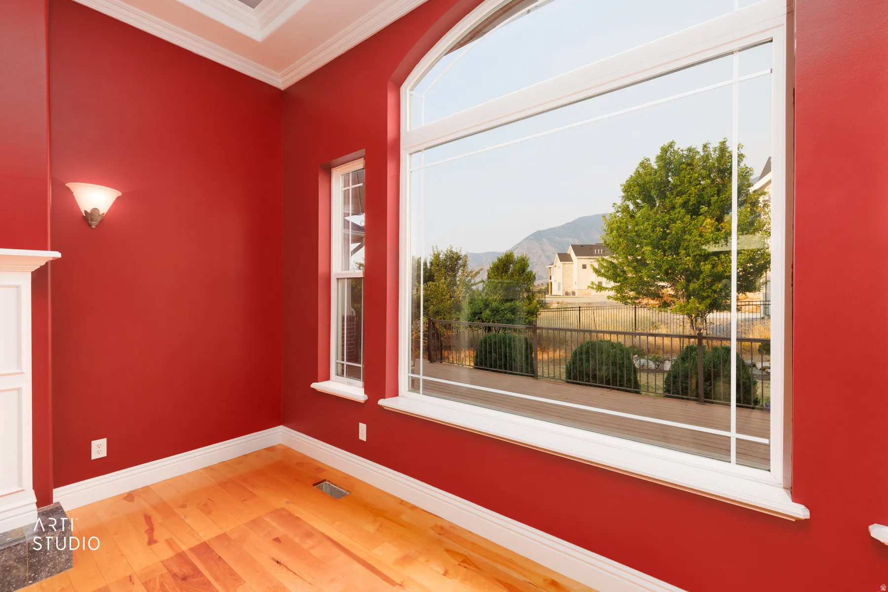 Arched picture window with white trim