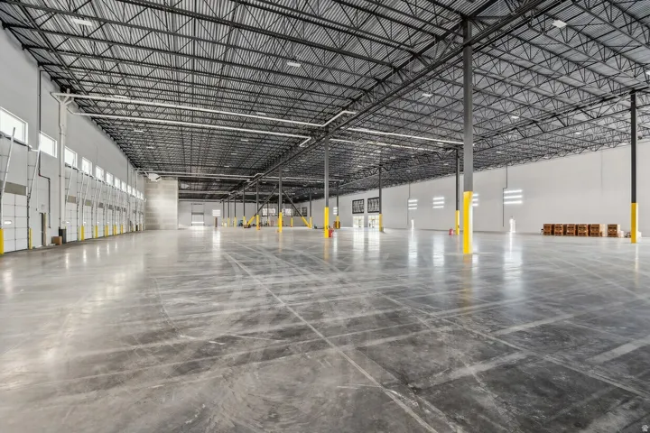 Spacious industrial warehouse featuring polished concrete flooring