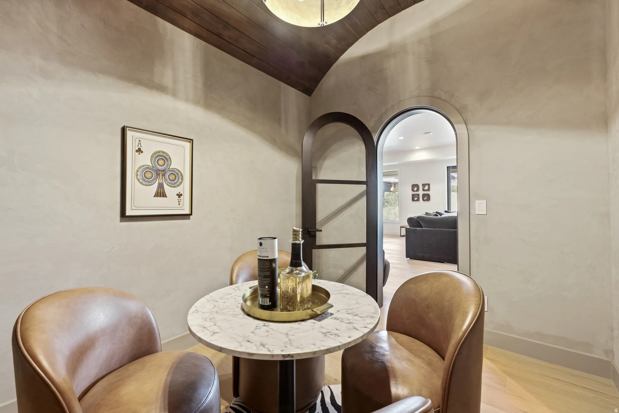 Wood-paneled ceiling with a recessed light fixture