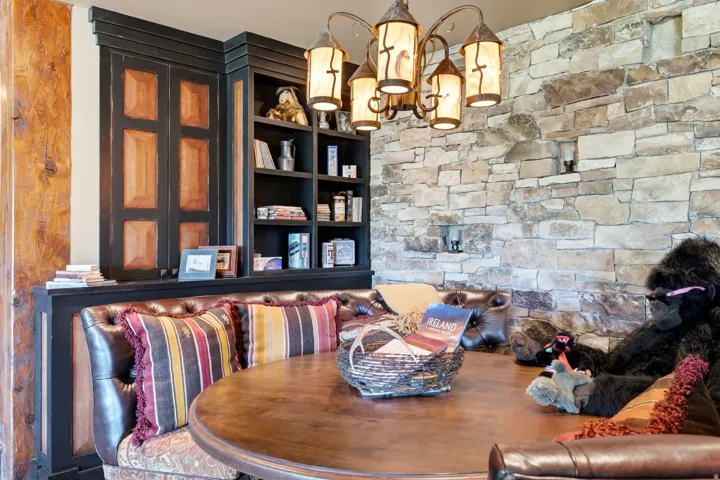 Built-in seating with tufted leather upholstery and patterned fabric