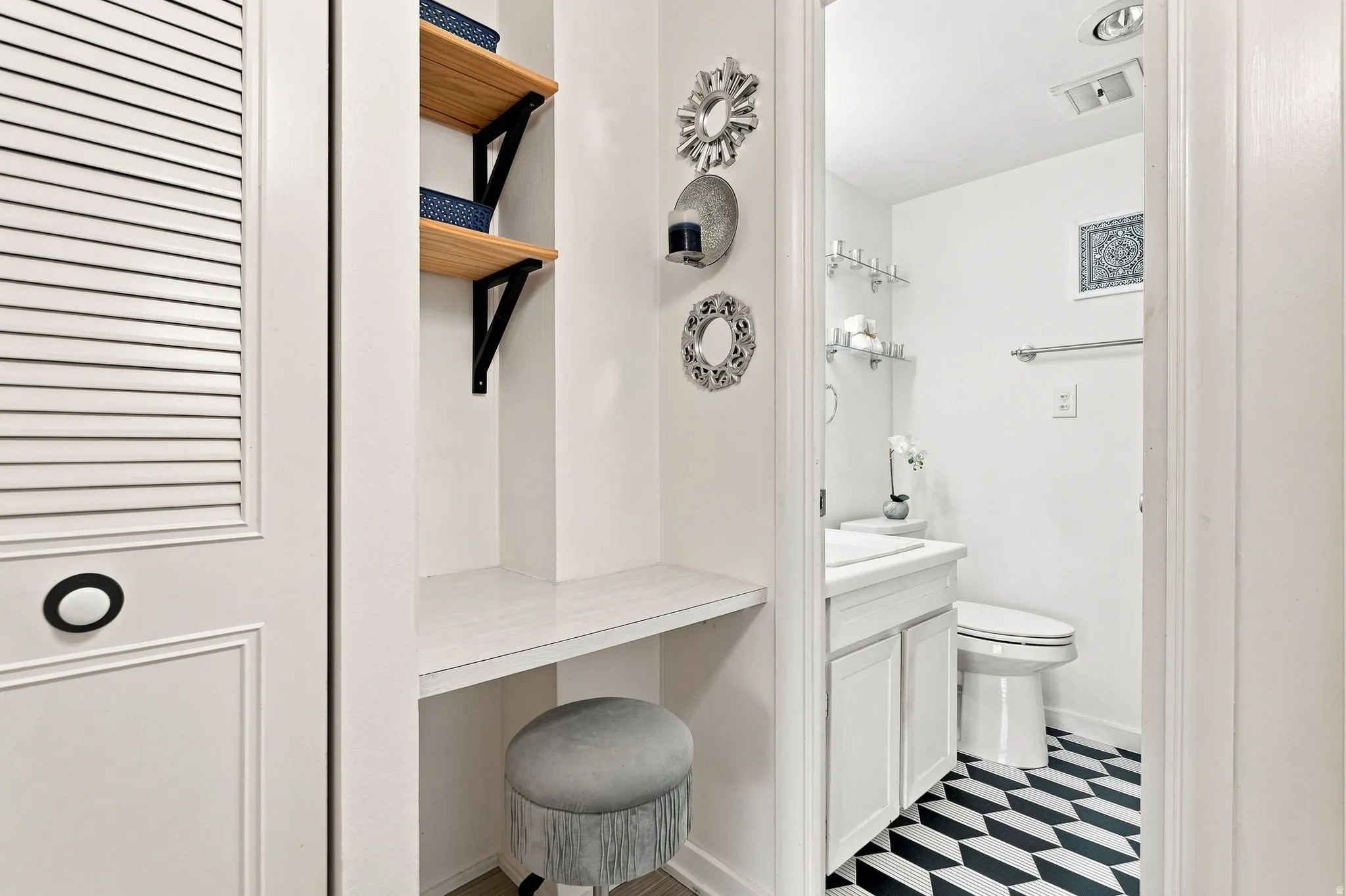 Integrated vanity desk with open shelving