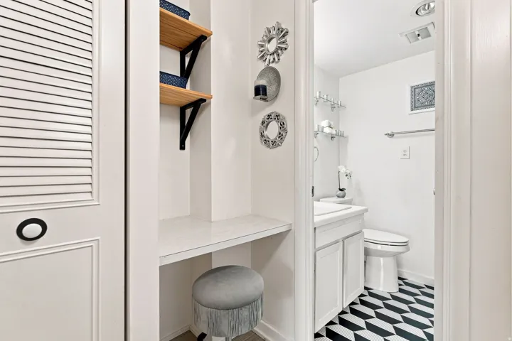 Integrated vanity desk with open shelving