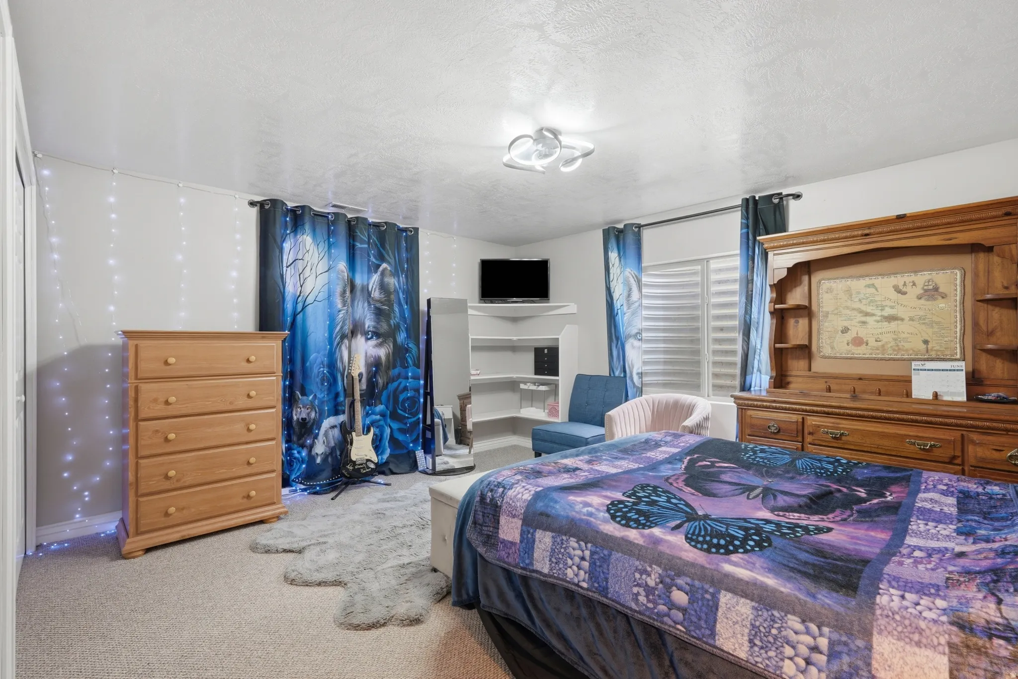 Bedroom featuring carpeted flooring and white walls
