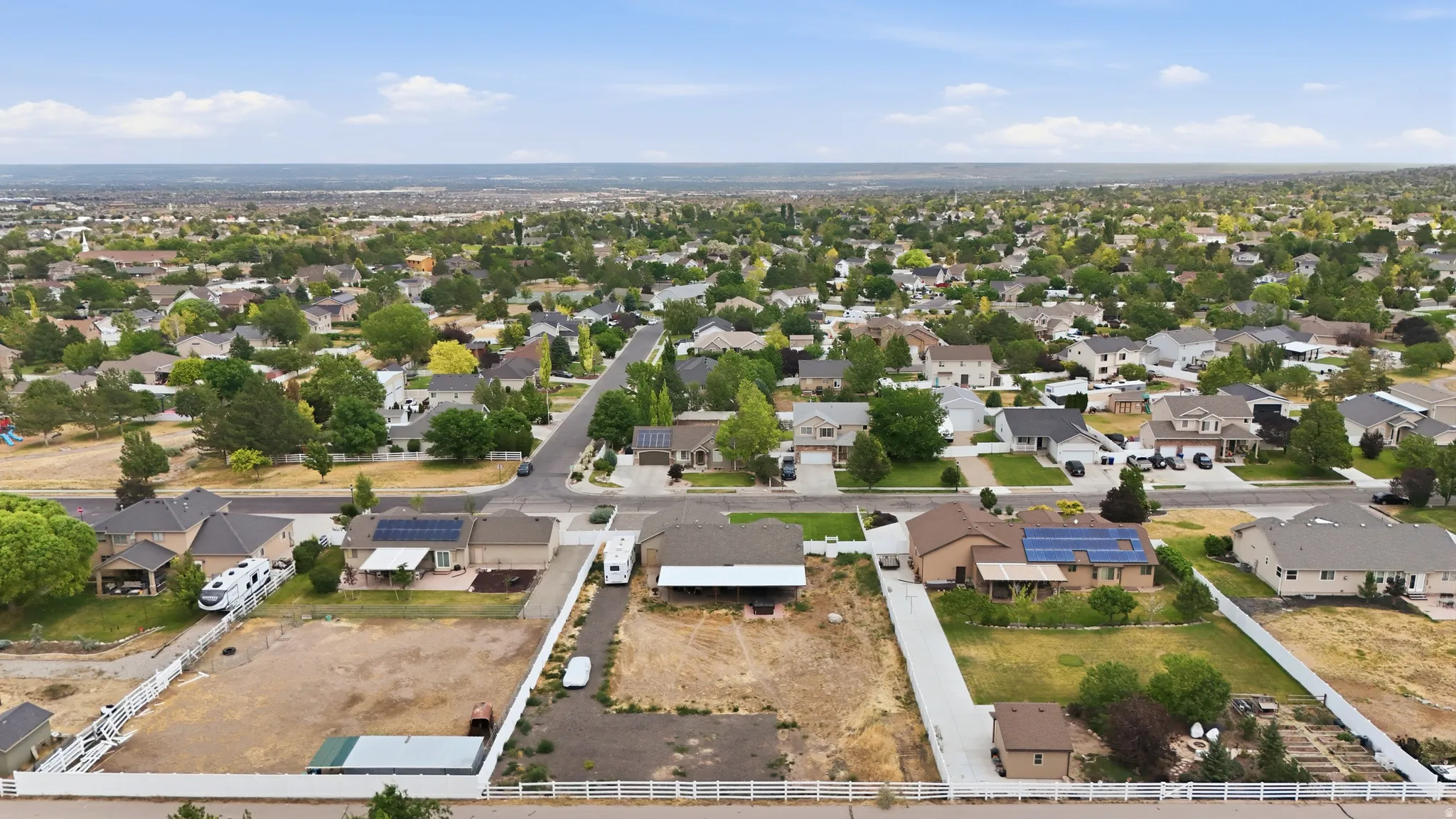 Residential neighborhood showcasing varied home styles and mature landscaping