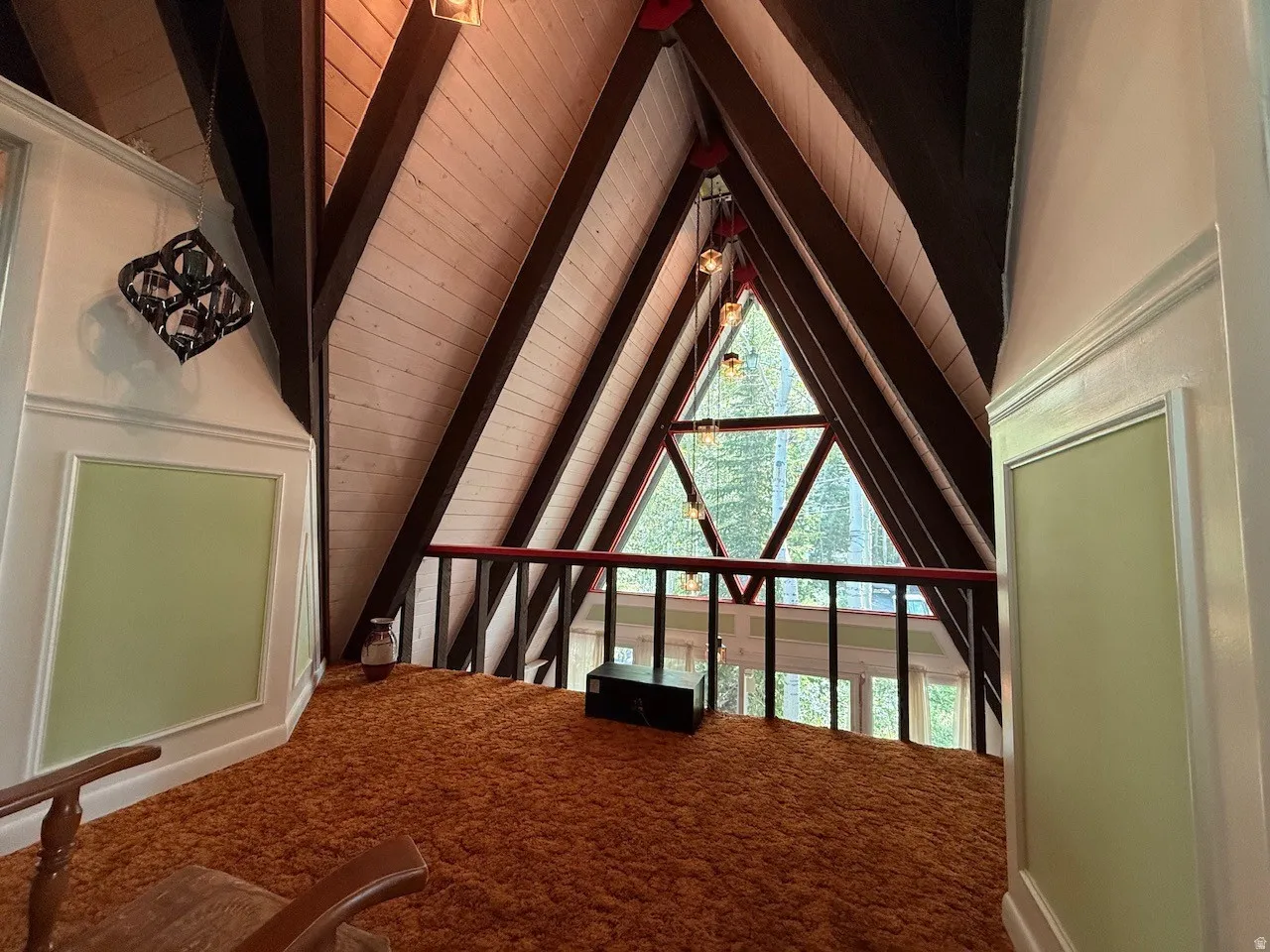 Vaulted wood-paneled ceilings with exposed beams