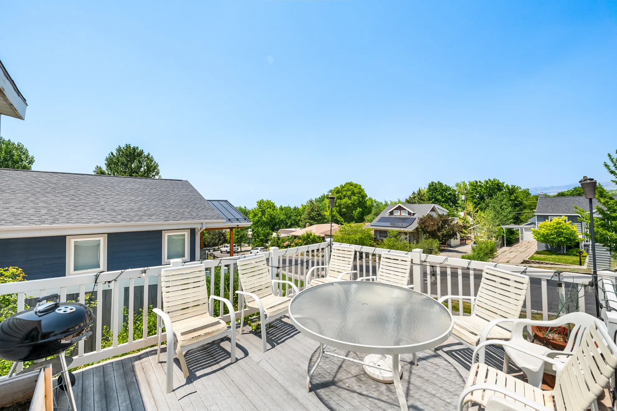 Valley View! Spacious outdoor deck featuring wood-finish flooring and white railing
