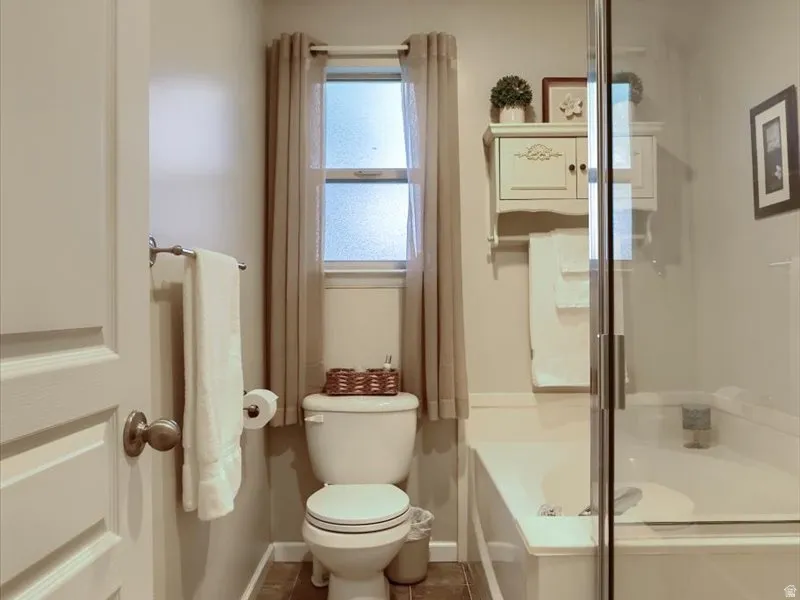 Primary bath with separate shower and soaking tub
