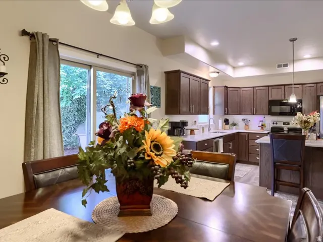 Dining situated next to kitchen