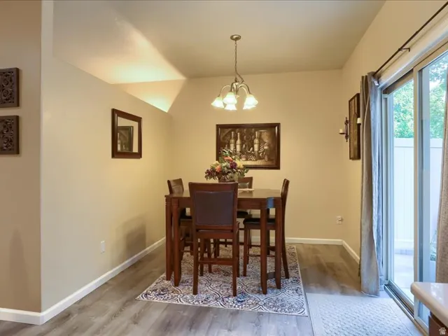 Dining area and door to back patio and private yard