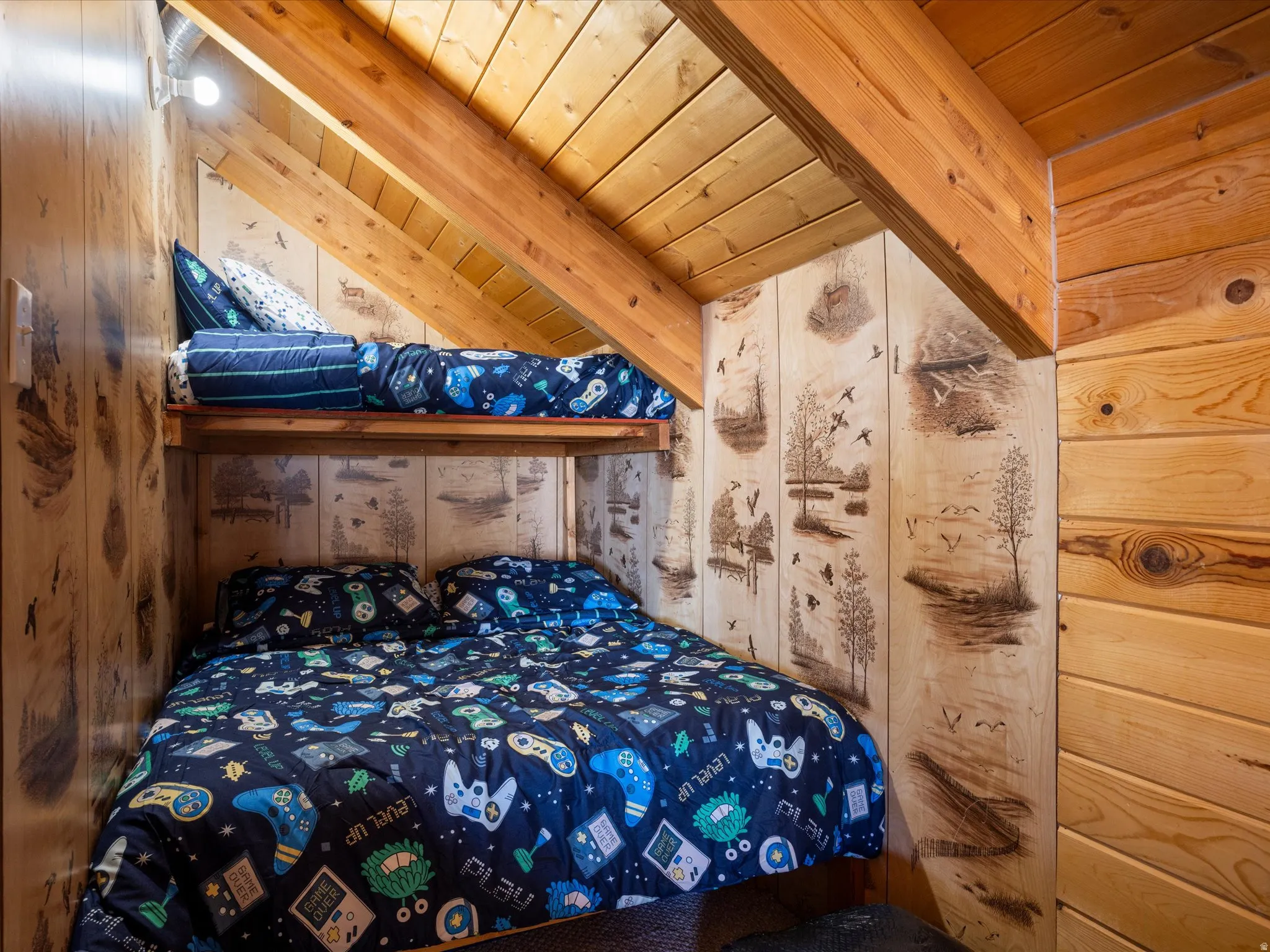Wood-paneled room featuring custom built-in bunk beds