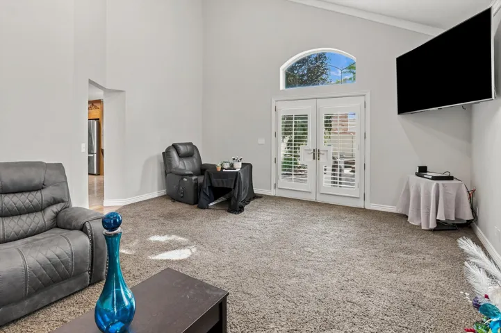 Vaulted ceilings complement the neutral wall tones