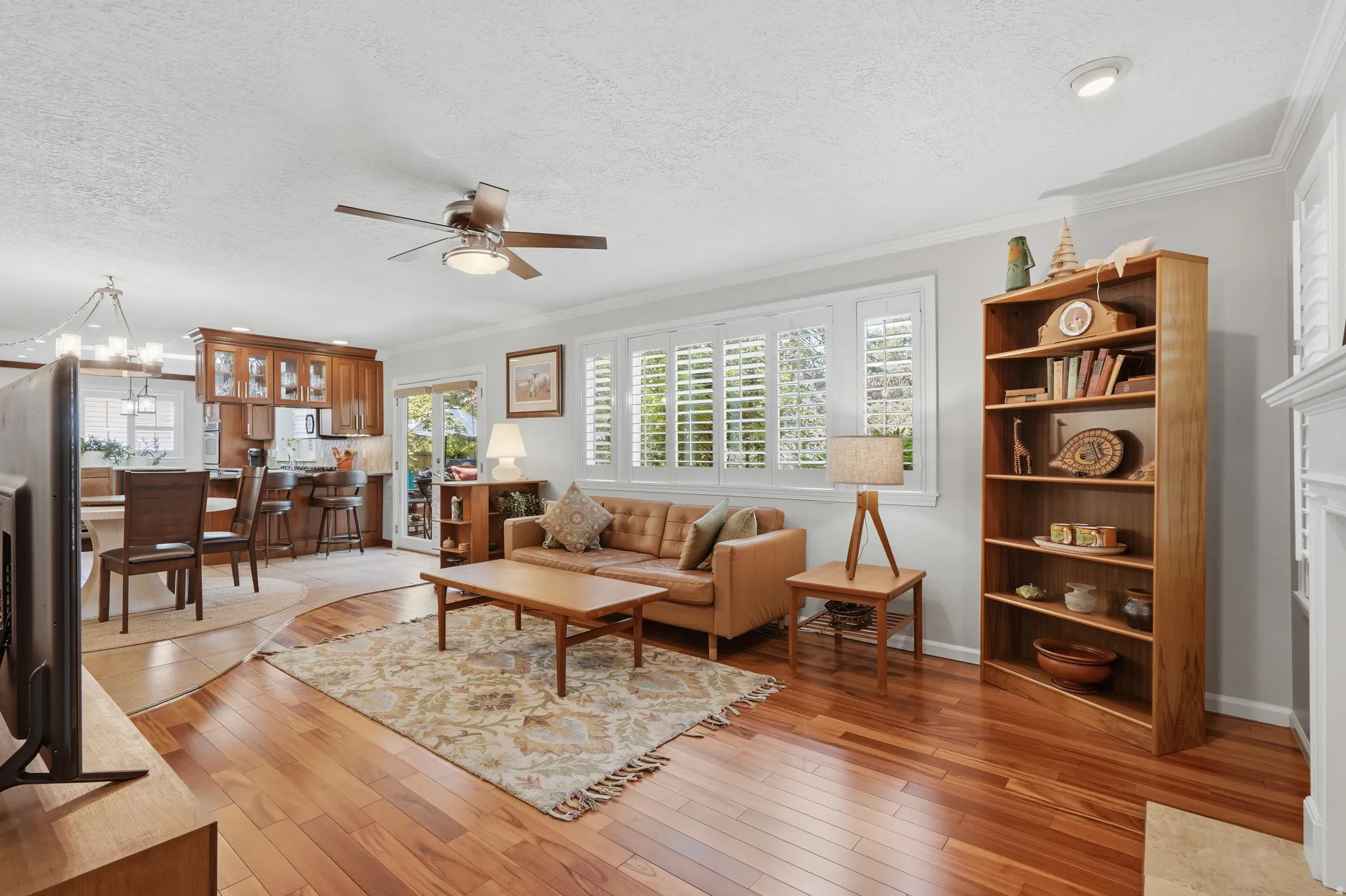Another view of Family Room w/ white plantation shutters