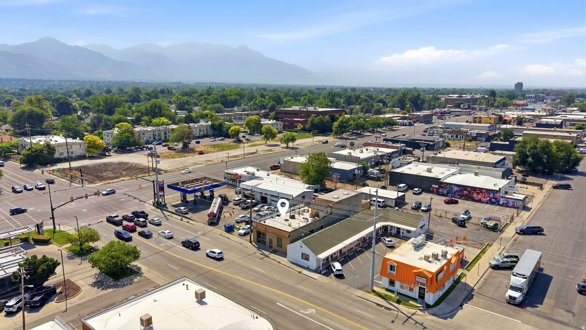 Aerial view showcasing a commercial area with multiple buildings