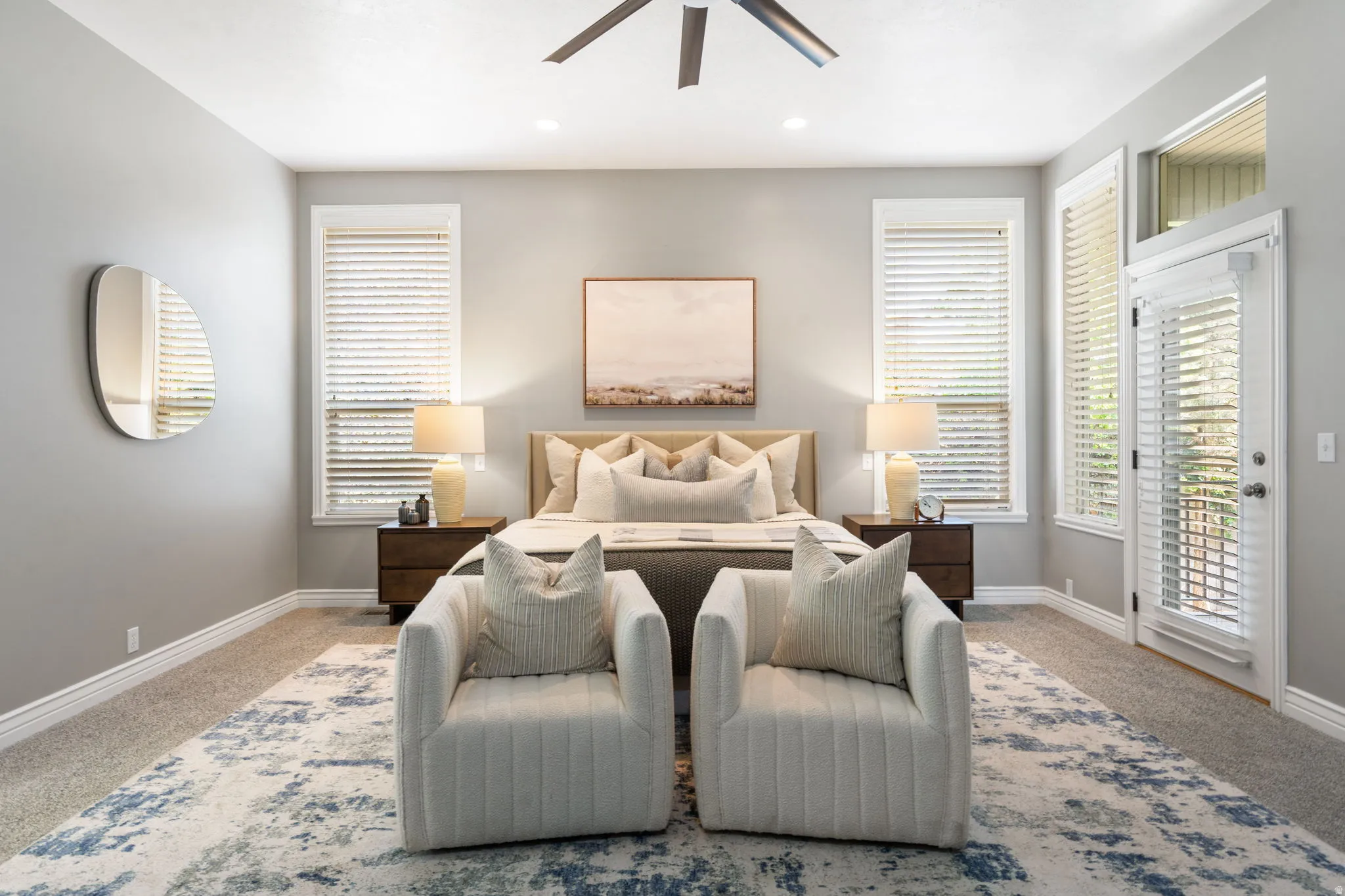 Main level, primary suite with direct deck access.