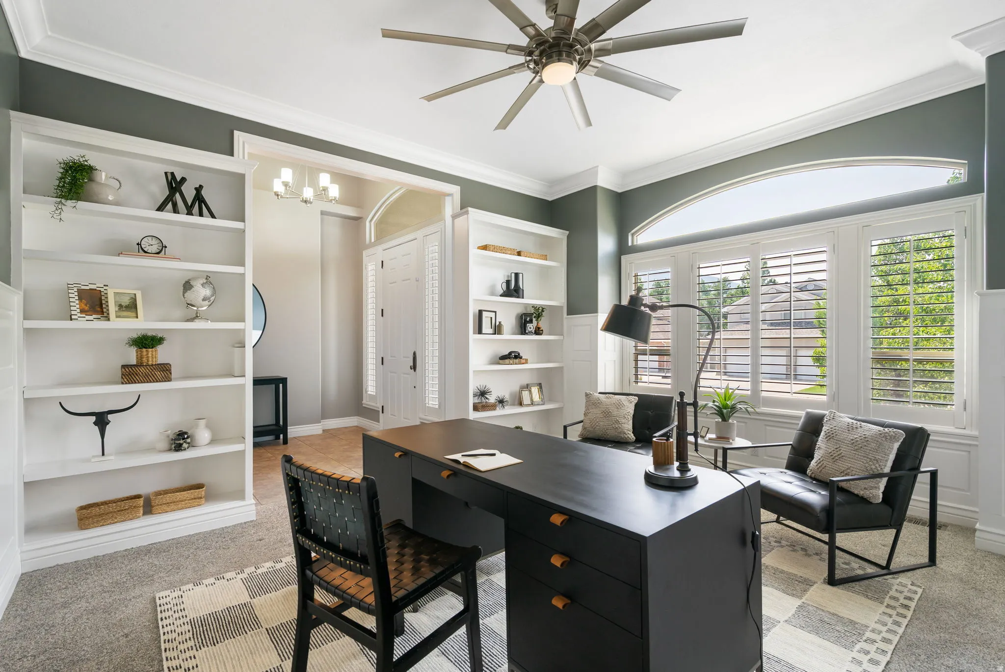 Office is just inside front entry allowing convenient client access with built-in shelving