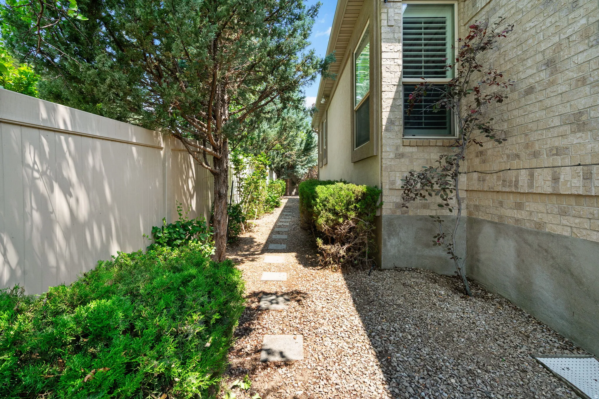 Low maintenance pathway from front of home to backyard