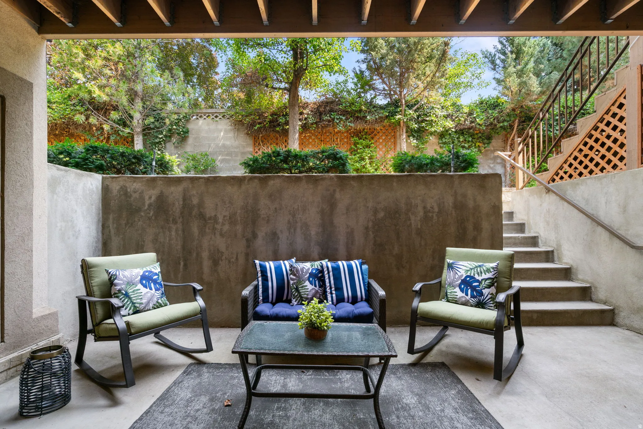 Private outdoor lower level patio accessed from family room or private fitness & wellness studio.