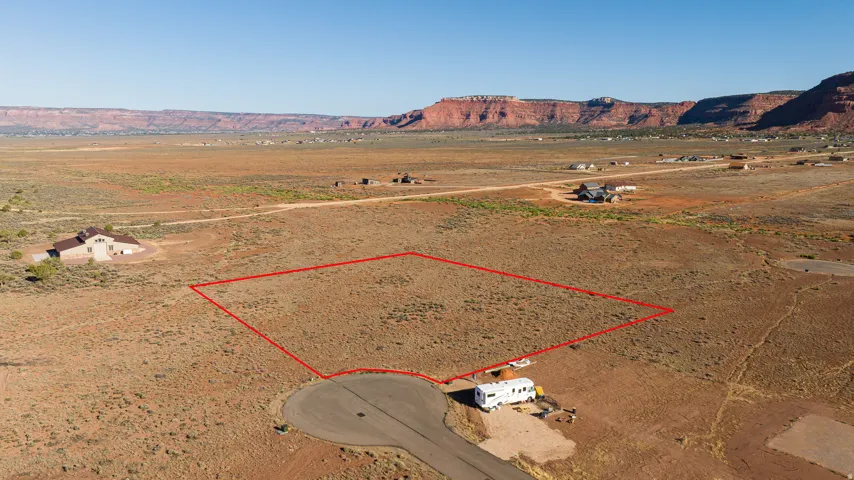 Expansive undeveloped lot with natural desert landscaping