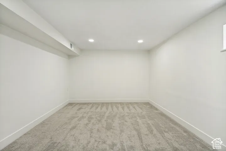 Large flex room that could serve as sleeping quarters if desired but is not an official bedroom.
