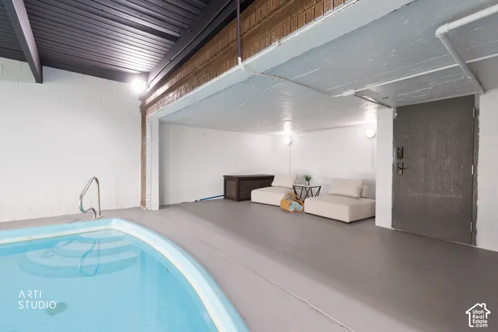 Indoor swimming pool with concrete surround