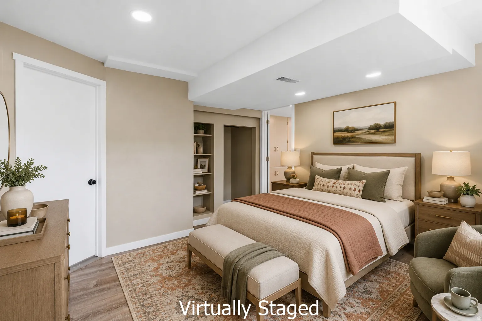 Recessed lighting illuminates this room featuring light wood-finish flooring