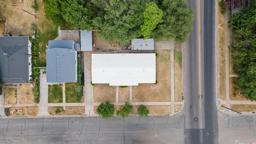 Aerial perspective showcasing the property's rectangular footprint and surrounding streetscape