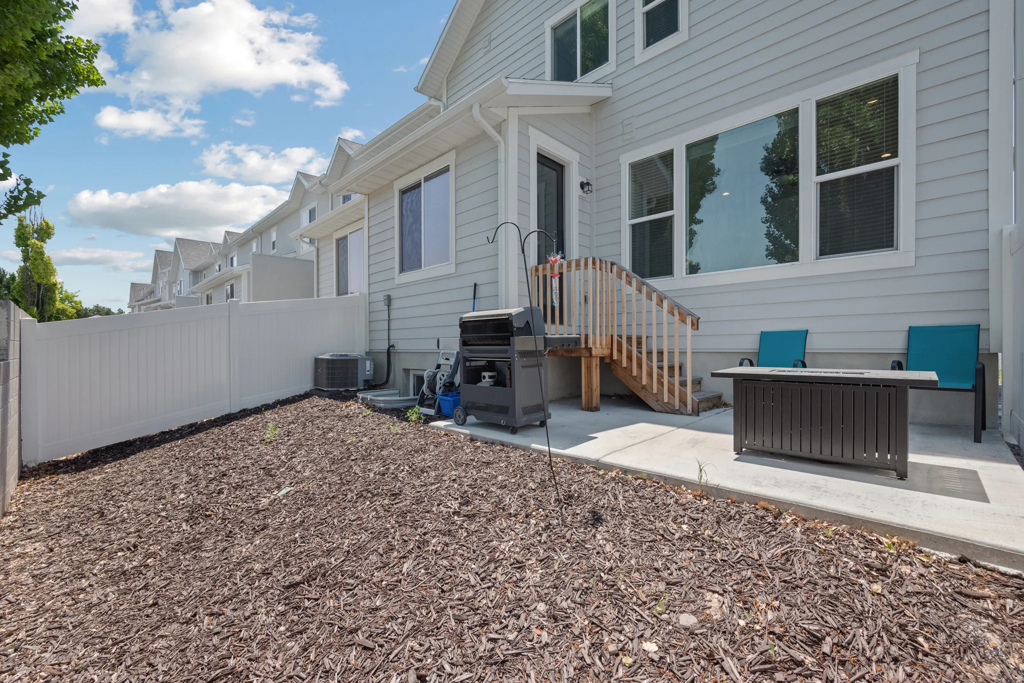 Private outdoor patio with concrete flooring