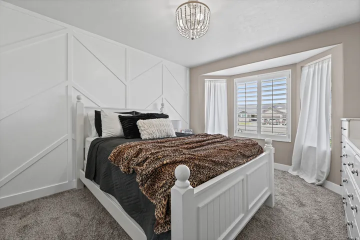 Bedroom 2 with gorgeous trimmed out feature wall
