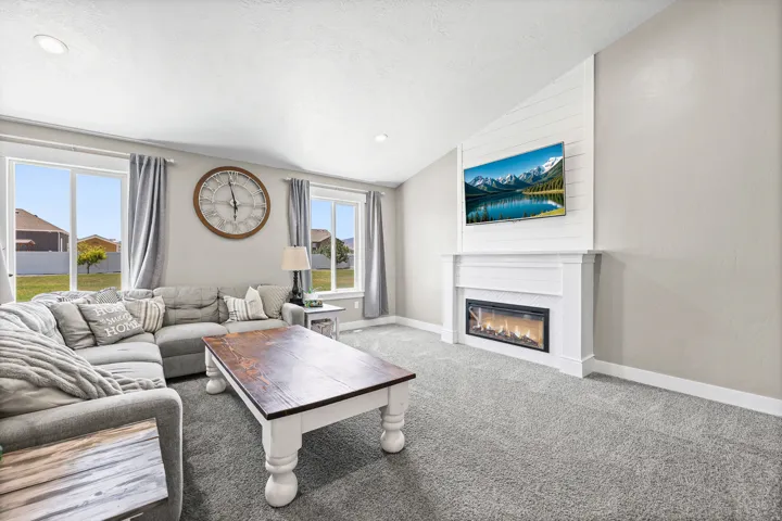 Plenty of room for extra seating around the beautiful gaslog fireplace.