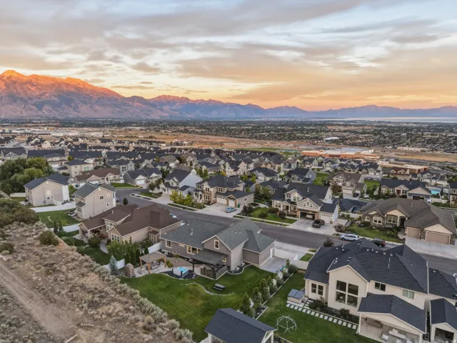Residential area with established landscaping and mountain scenery
