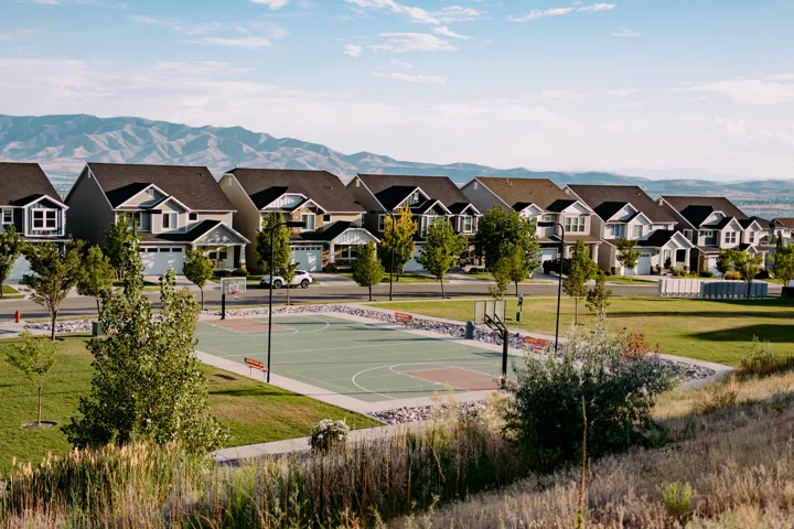 Neighborhood park featuring a multi-sport court and open green space