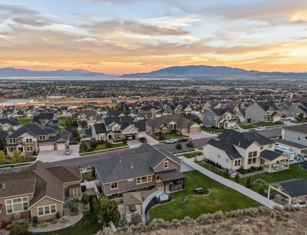 Extensive residential neighborhood with distant mountain and water features