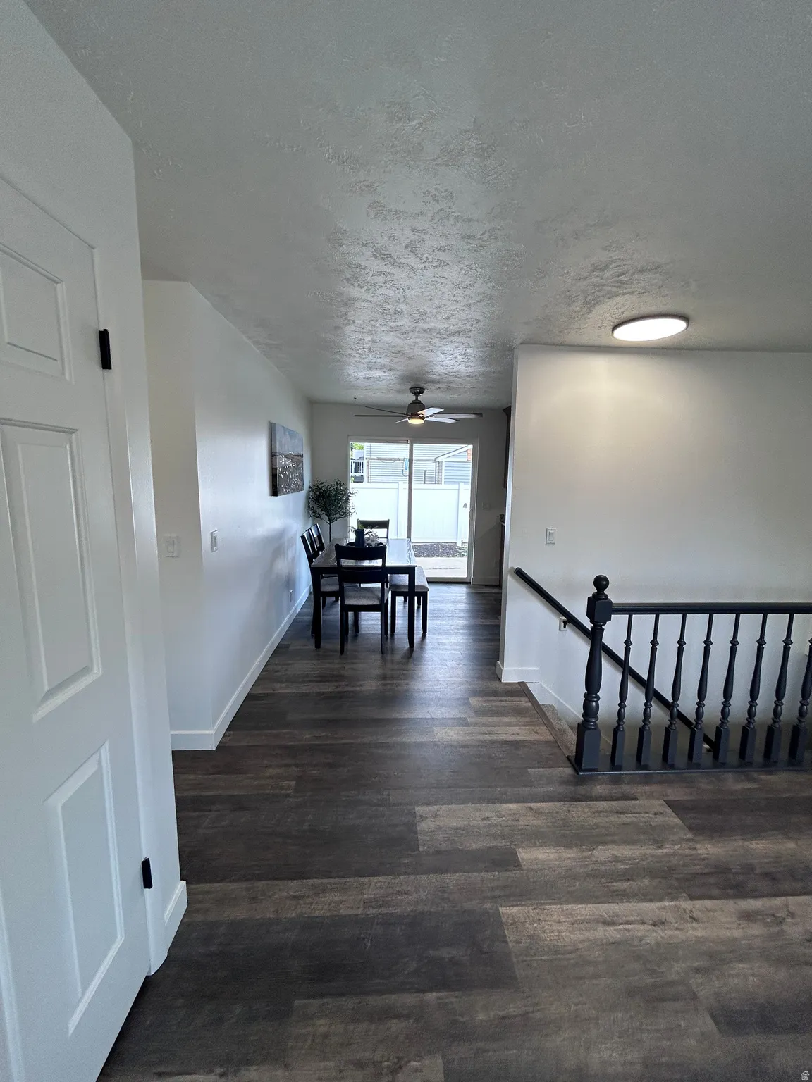 Spacious interior featuring wood-finish flooring throughout