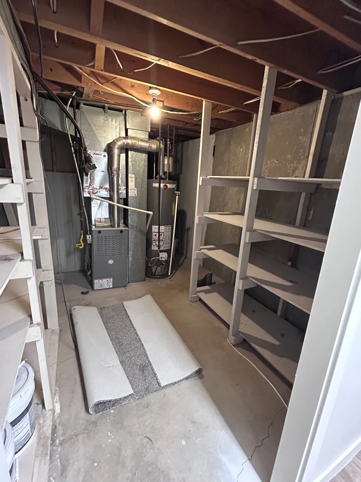 Exposed ceiling joists with visible electrical conduits