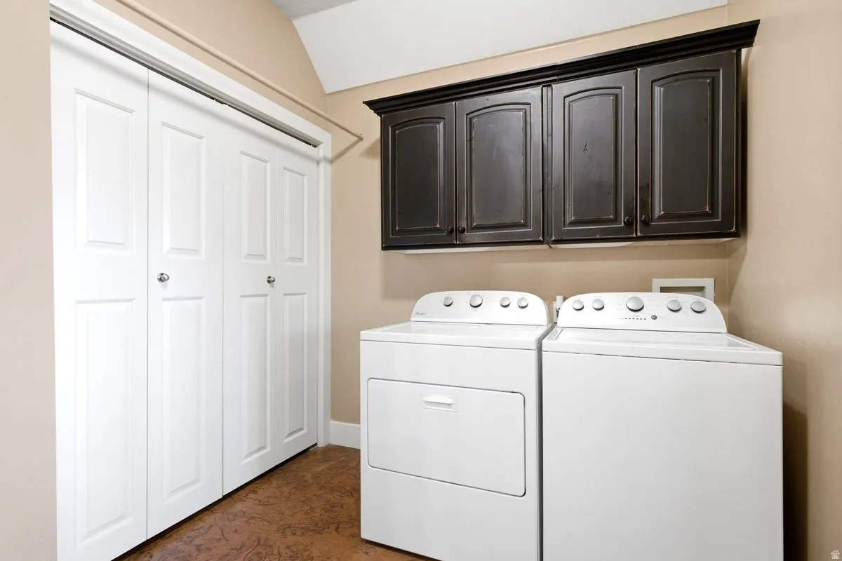 Laundry area on main floor with storage and easy access to HVAC