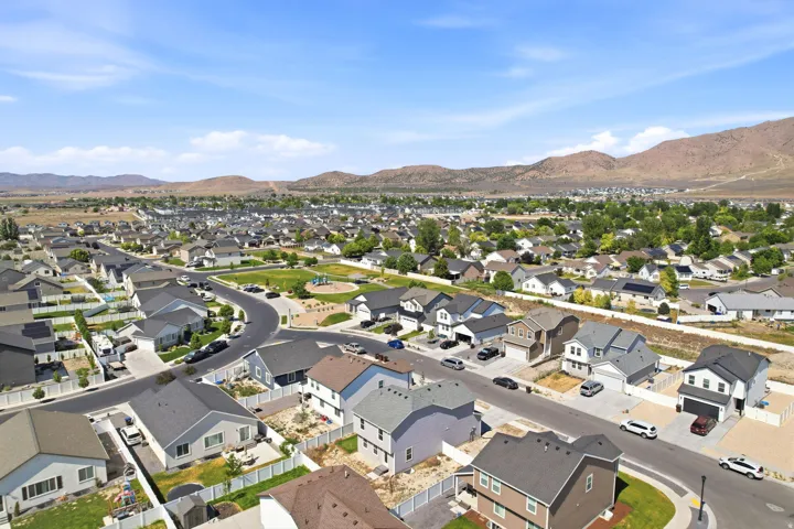Expansive residential community featuring diverse architectural styles and paved streets