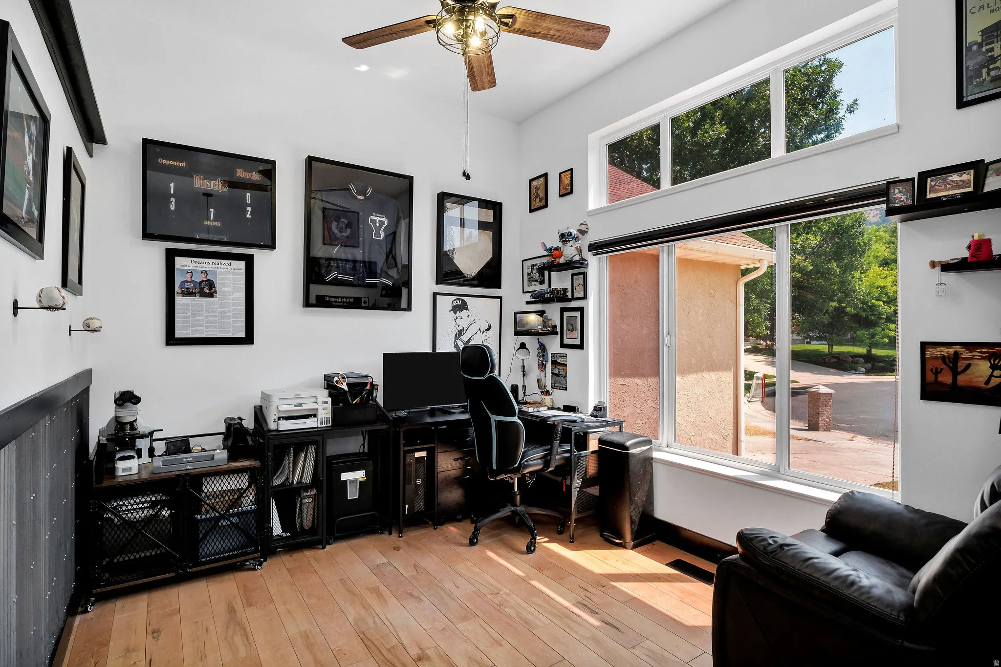 Bright room with wood-finish flooring and high ceilings