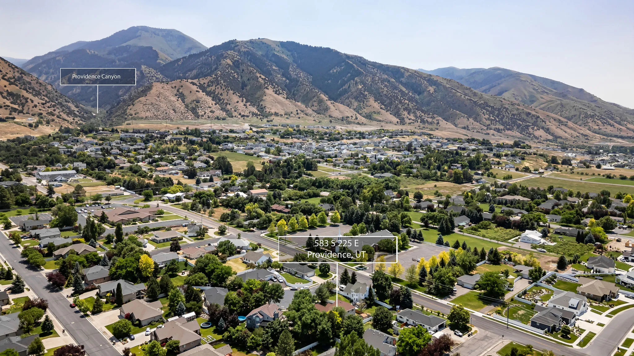 Aerial perspective showcasing a residential neighborhood with varied housing styles