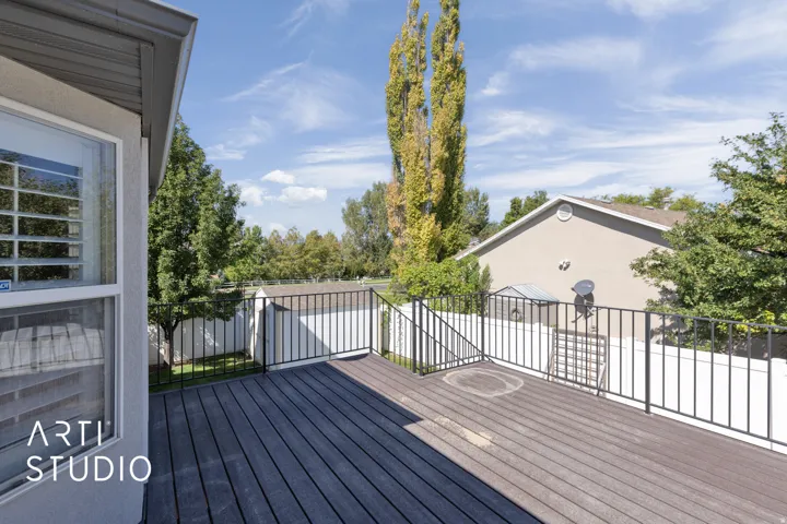 Composite decking with black metal railing