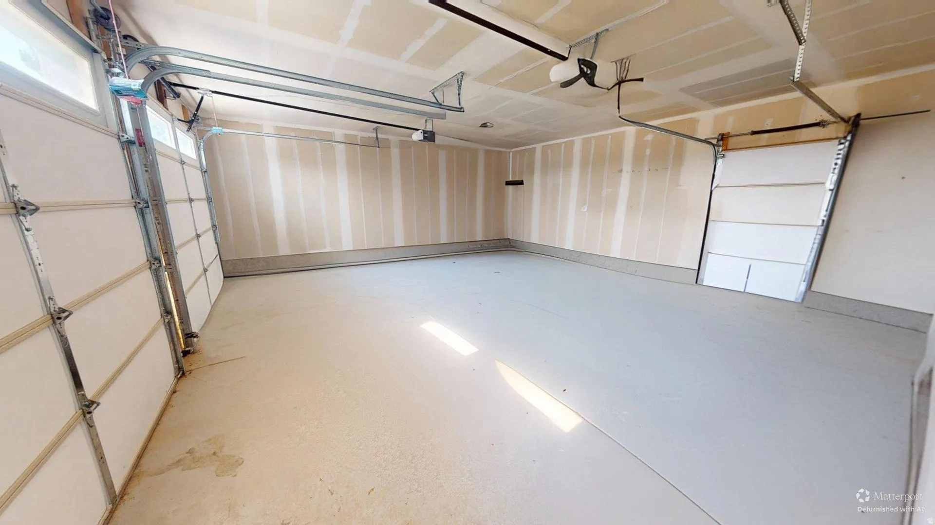 Ai enhanced photo. Spacious garage featuring a light-colored concrete floor, two overhead garage doors, and exposed ceiling joists
