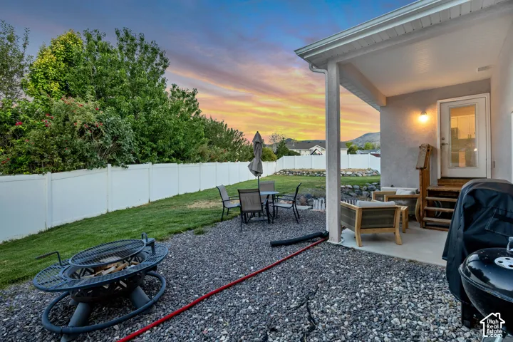 Covered patio with exterior lighting and direct access to the interior