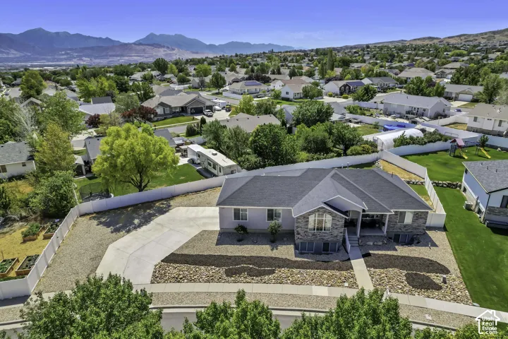 Modern ranch-style home featuring a stone and siding exterior