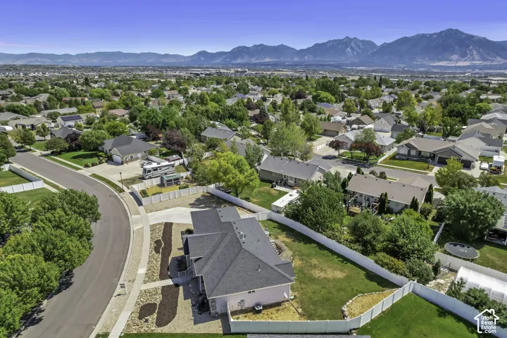 Expansive residential landscape with distant mountain ranges