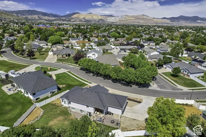 Expansive residential neighborhood featuring paved streets and manicured lawns
